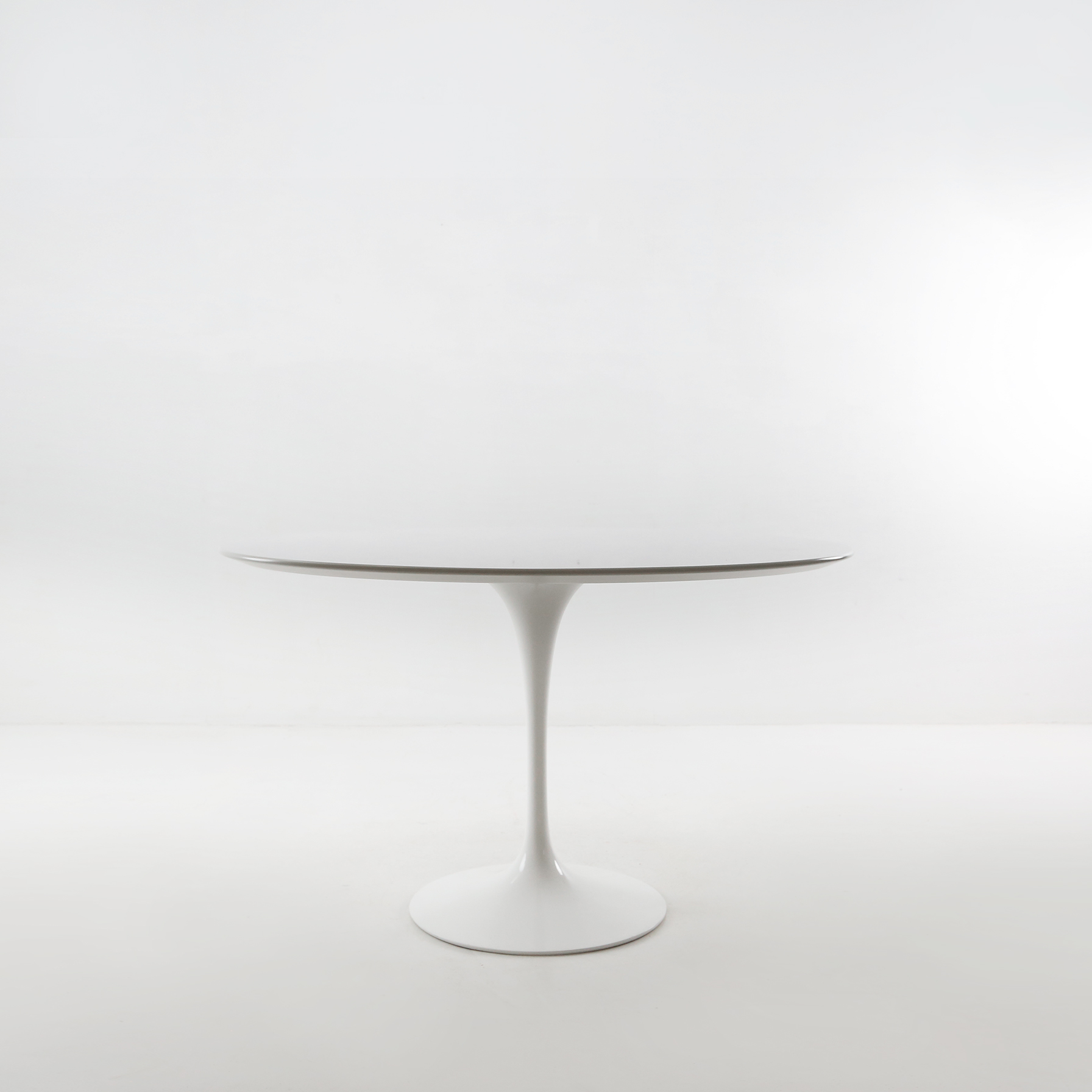 Dining table by Eero Saarinen for Knoll